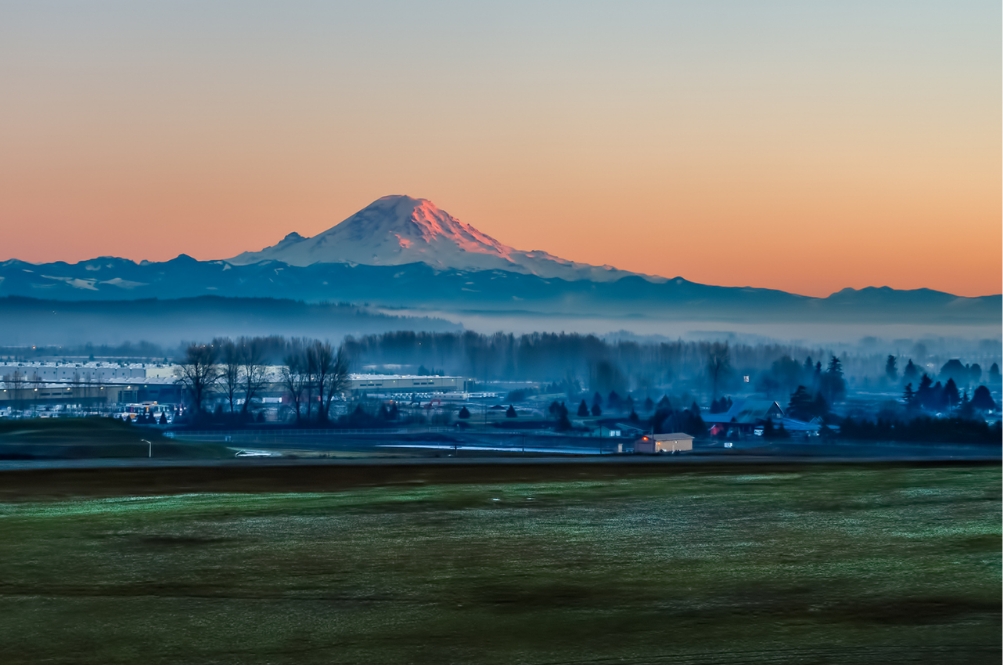 snowy mountains with sunset