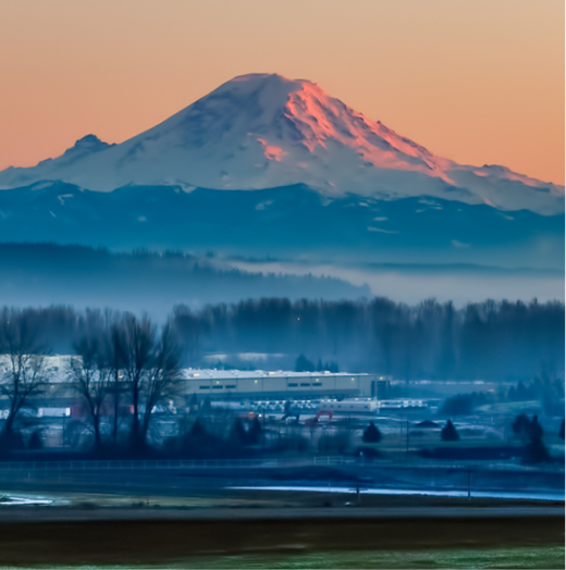 snowy mountain with sunset
